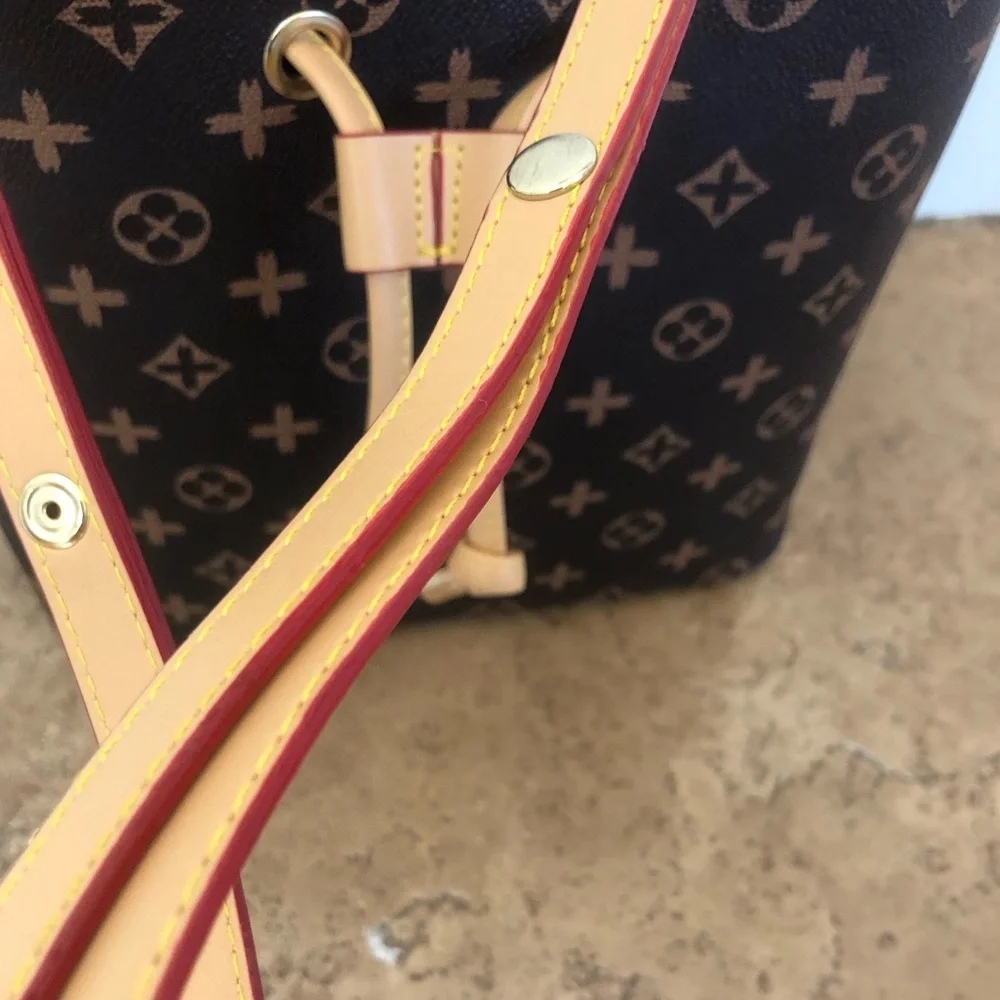 INSPIRED-BY MONOGRAM BUCKET BAG - DETACHABLE STRAP ( GOOD CONDITION)